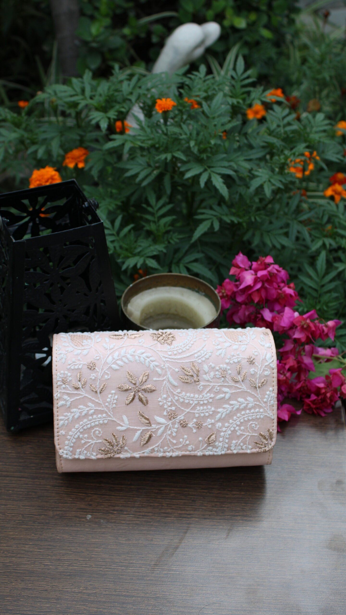peach pink chikankari clutch