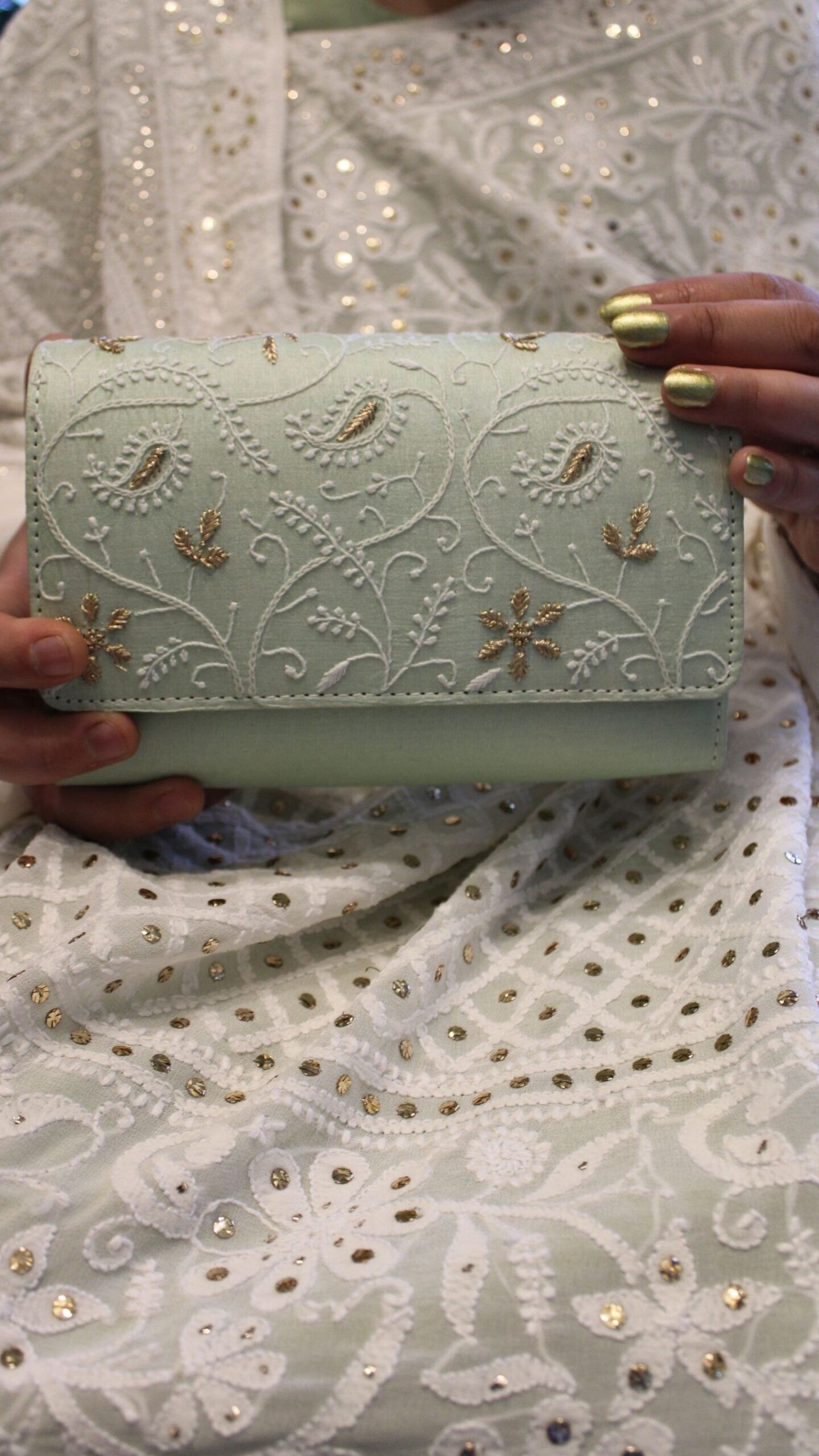 27 sage green chikankari clutch