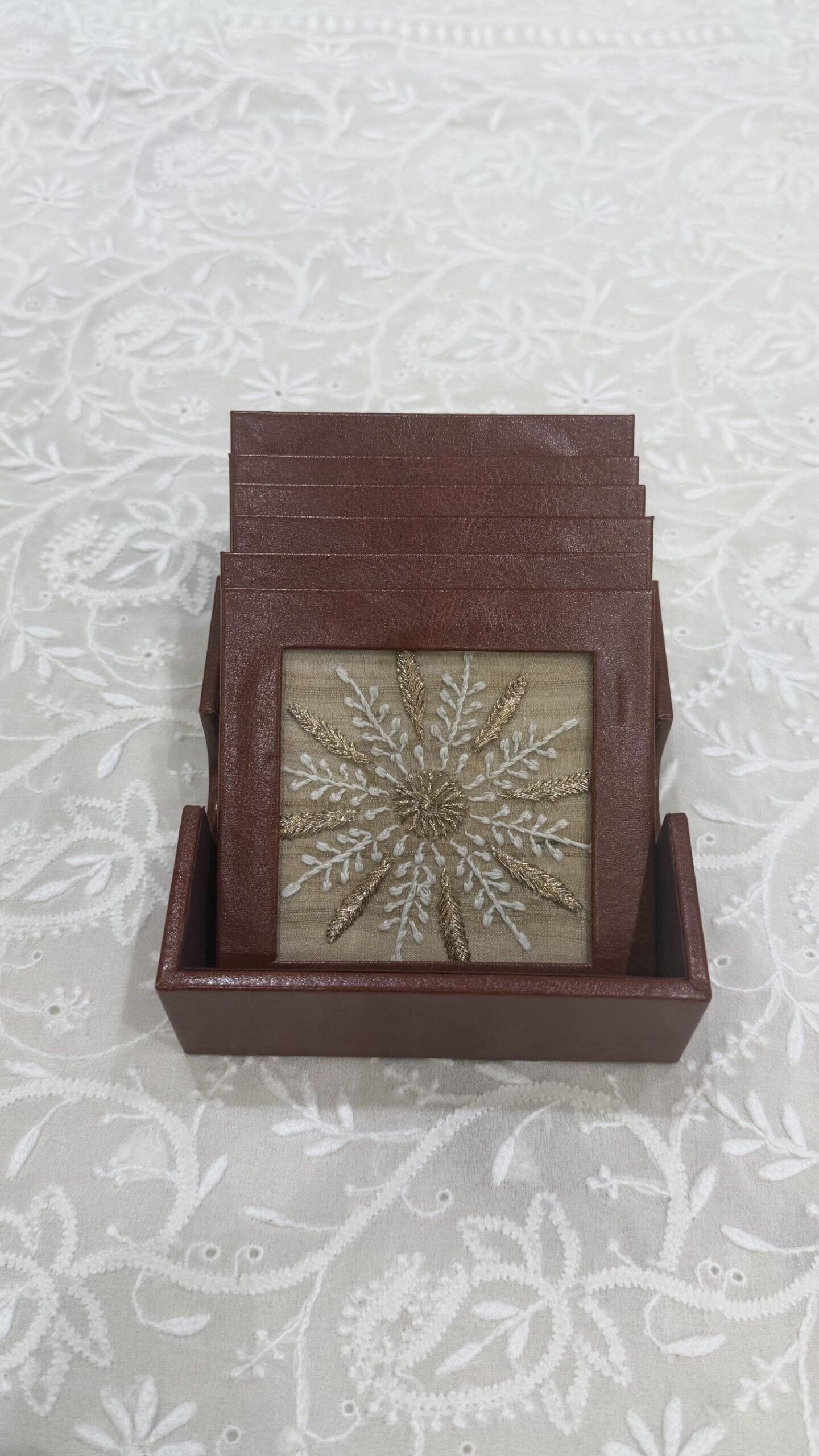 1 beige chikankari leather coaster